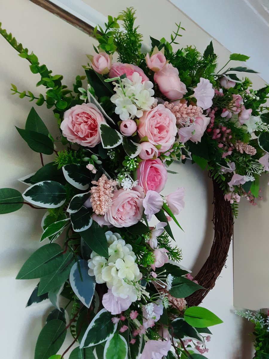 Sandy. Large half wreath  ,pink's,white and green 