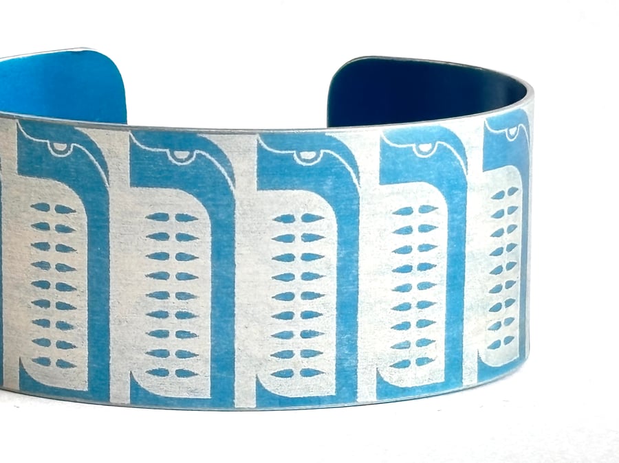 Geometric penguin pattern aluminium - blue 