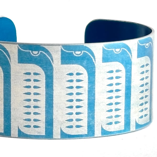 Geometric penguin pattern aluminium - blue 