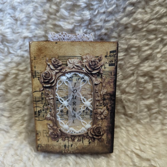 Stunning wee grungy thick junk journal in neutral colours