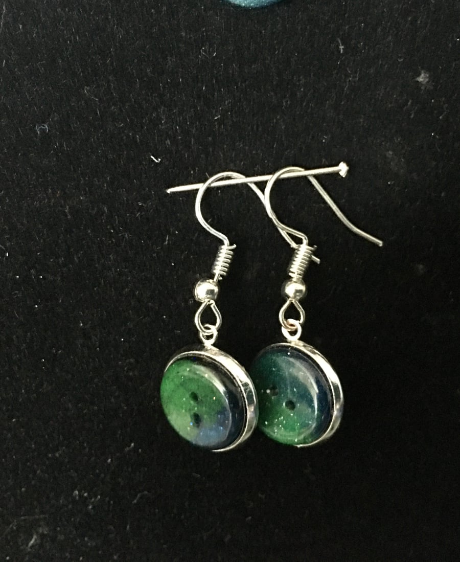 Aurora button dangly and stud earrings.