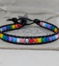 Pride flag beaded bracelet with black leather and star button - Image 8