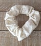 Cream and green polkadot scrunchie 
