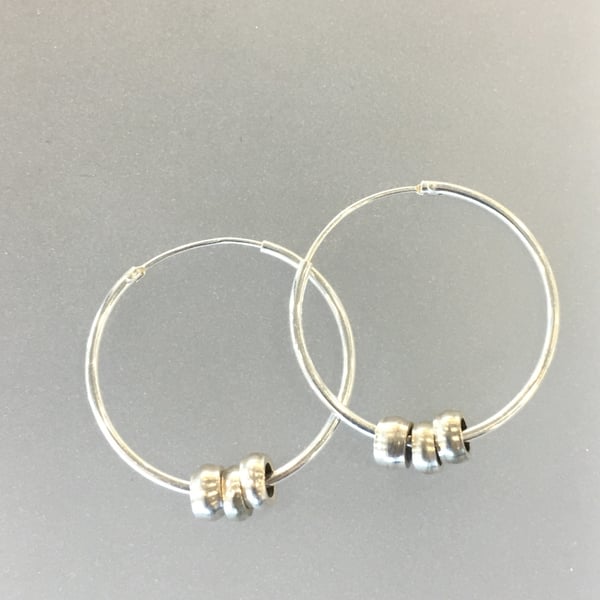 Reserved. Silver hoop and bead earrings