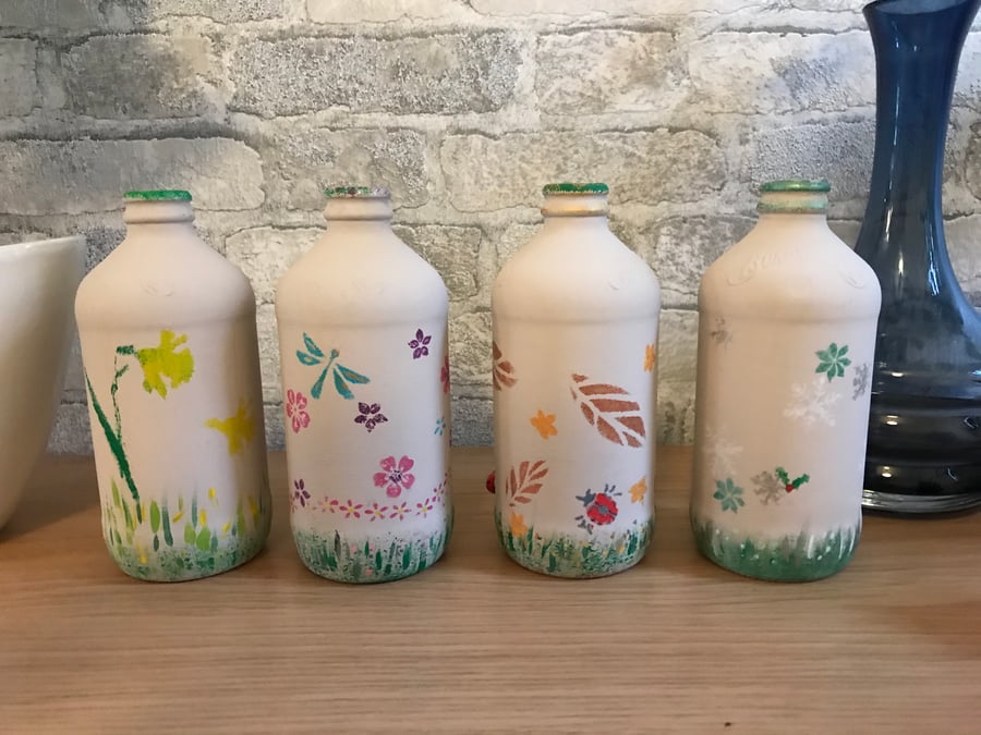 Set of Four Seasons Painted Bottles 