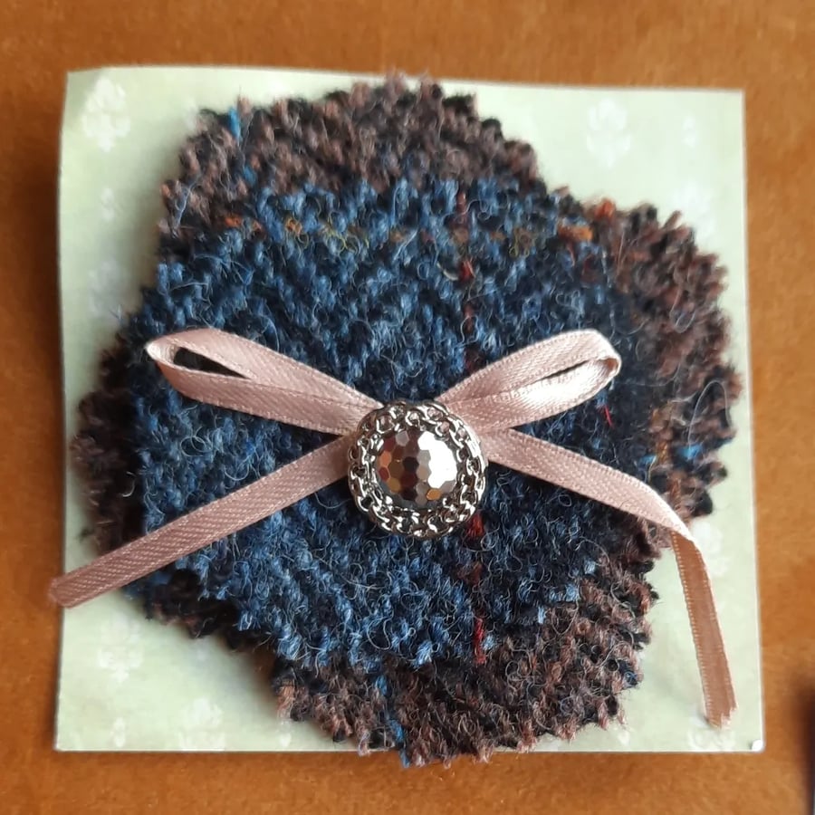 Tweed brooch with textured silver button and bow