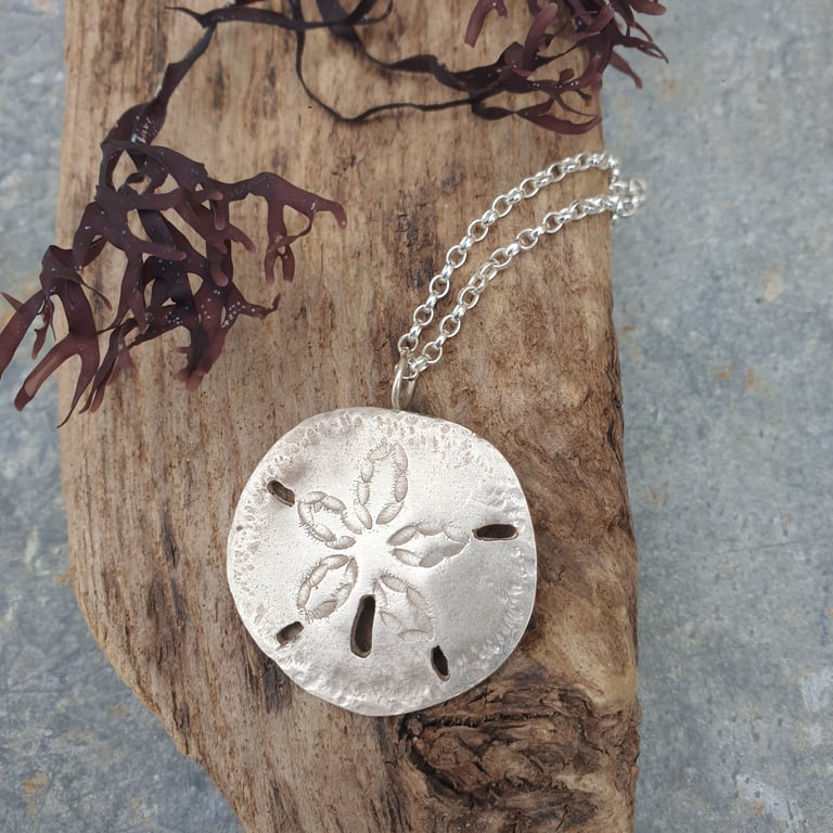 Fine silver sand dollar pendant