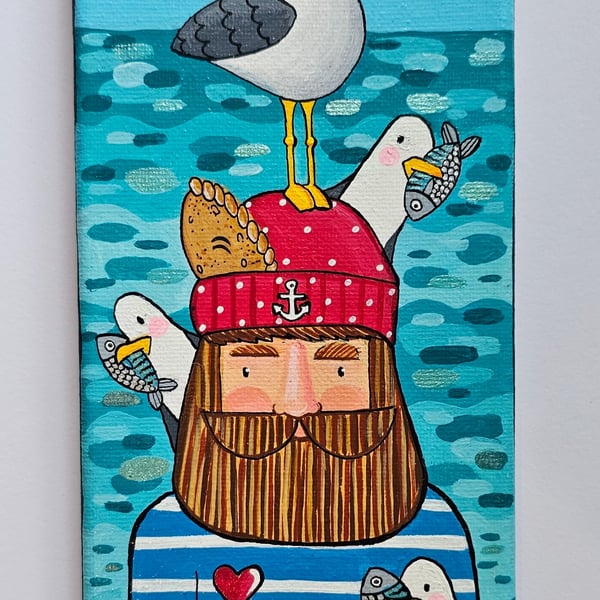 Handpainted canvas of a cornish fisherman with a cornish seagull on its head.