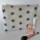 Large flat cotton zipped pouch, purse, make up bag in beige with navy starfish