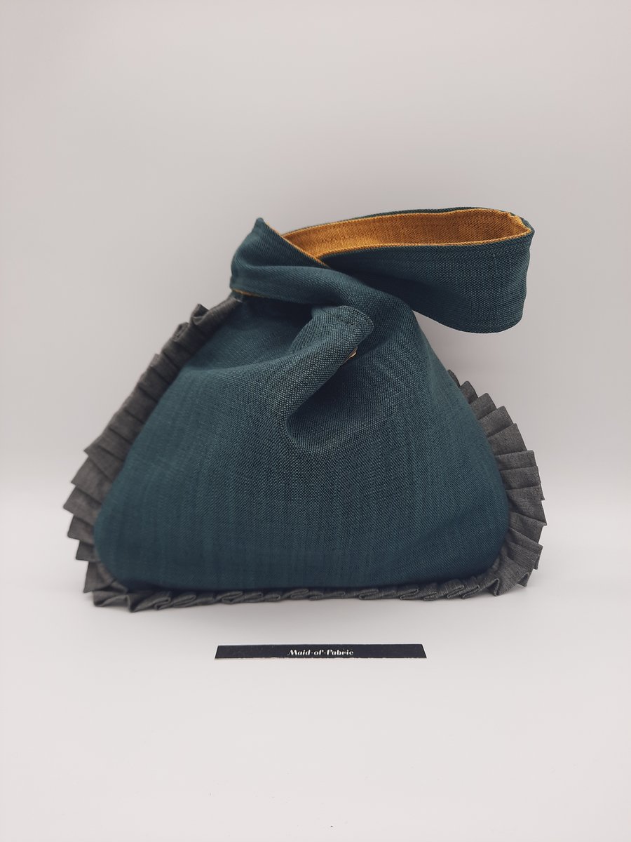 Pleated, reversible small knot bag,  yellow and forest green. 