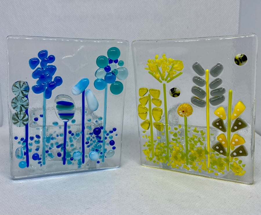 Tea-light holder with a floral fused glass panel 