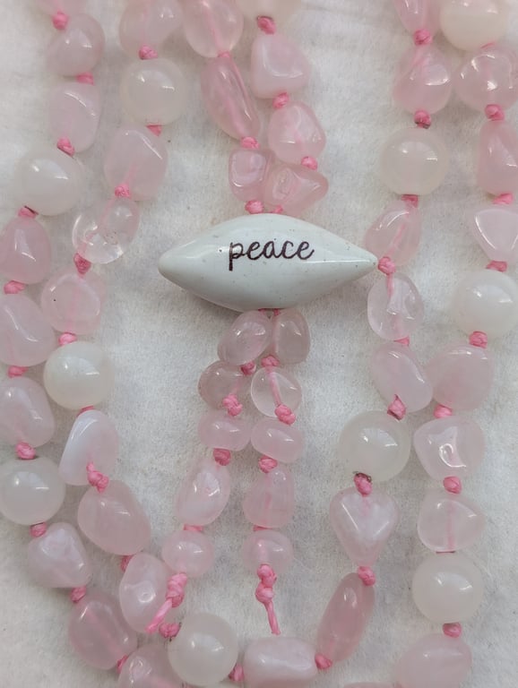 Rose quartz and jade knotted cord necklace with peace ceramic focal bead