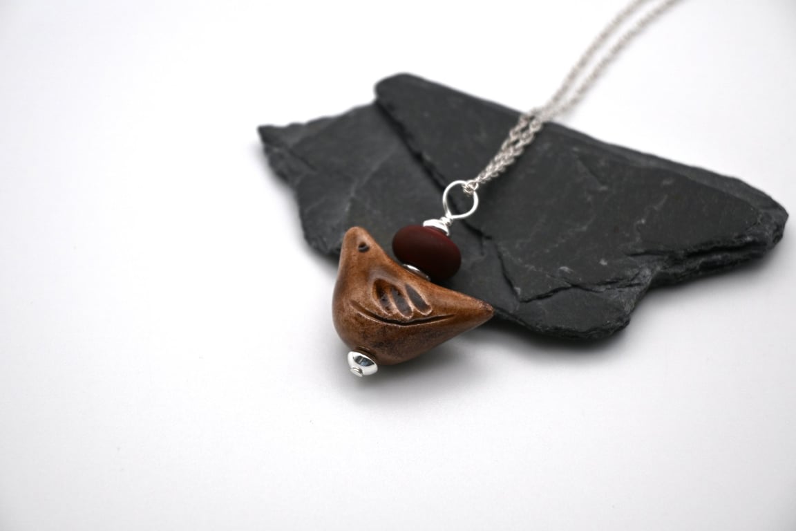 brown ceramic bird pendant necklace