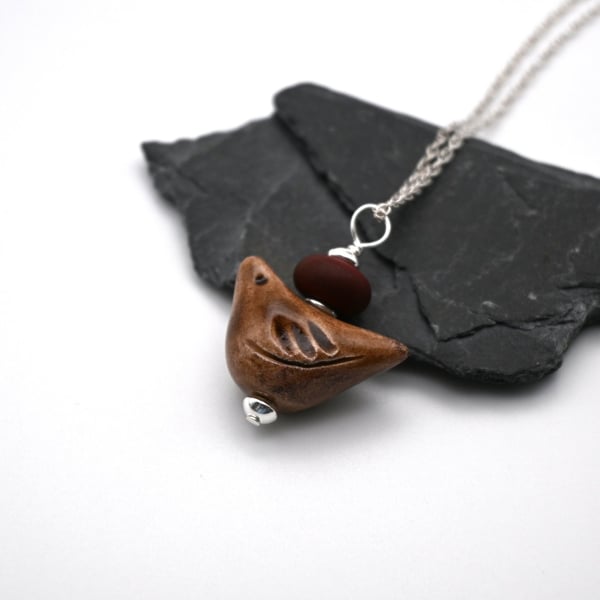 brown ceramic bird pendant necklace
