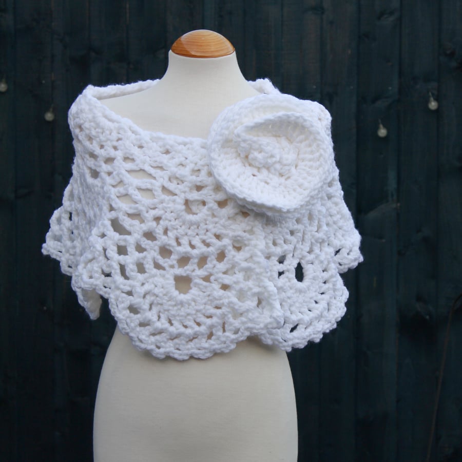 Crochet wrap in white acrylic yarn with flower brooch - design SB188