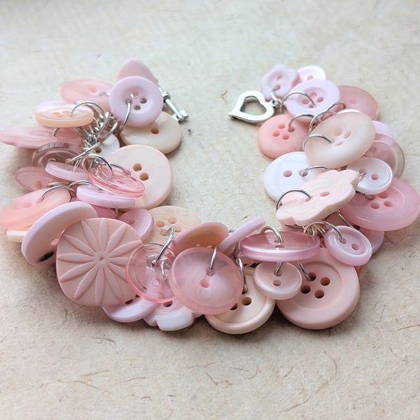 Blush pink button bracelet with heart toggle clasp