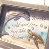 (reserved) dolphin, sea turtle picture, framed in a tin
