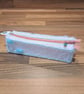 Pencil case - light pink and light green with pink zip, blue charm, and bobbles - Image 3