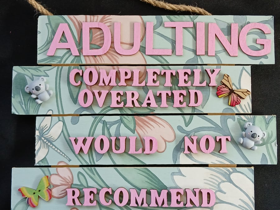 Hand decorated hanging wooden sign 