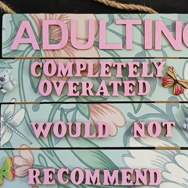 Hand decorated hanging wooden sign 