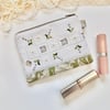 Coin purse in reclaimed embroidered cloth with William Morris fabric green 