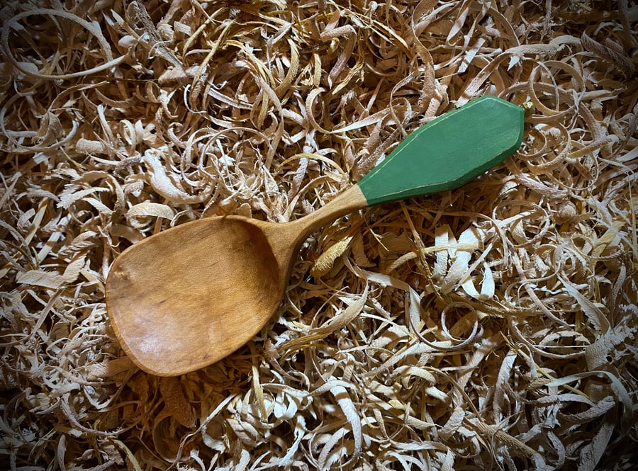 Symmetrical Sycamore Wood Eating Spoon with green handle and gold finial