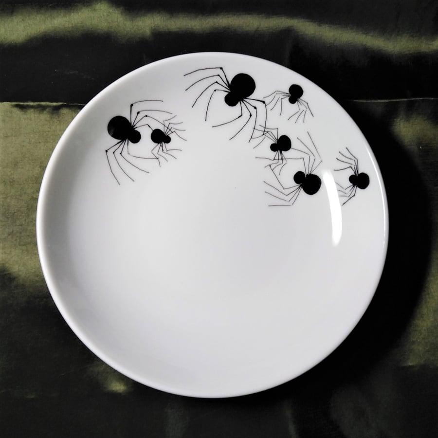 Spiders on a cereal or pudding dish in white bone china decorated with spiders