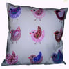 Appliqued cushion with birds