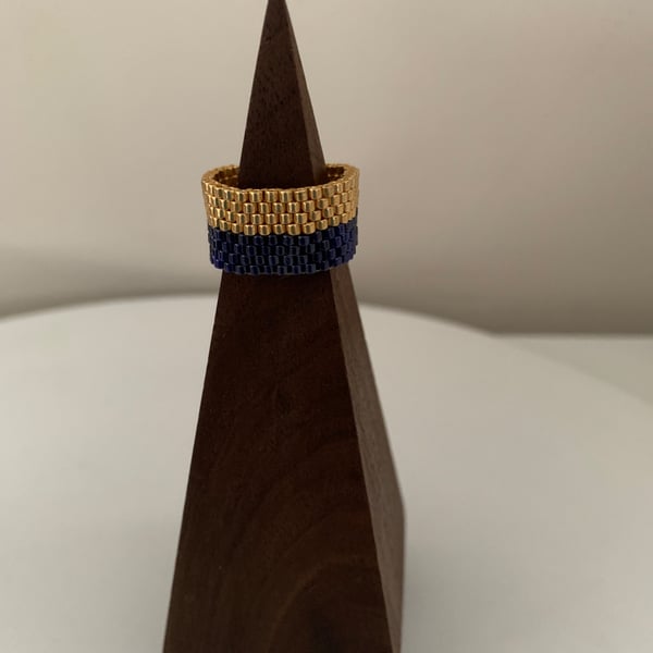 Stylish blue and gold coloured beaded ring