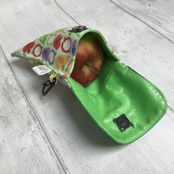 Dog treat or snack pouch with wipe-clean lining. Green bird design.