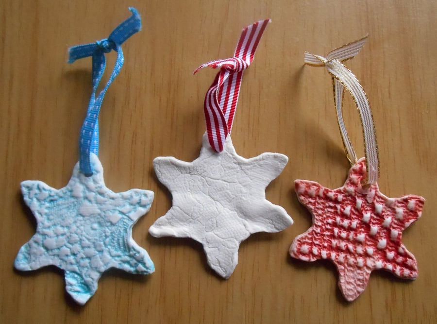 Decorations for trees Porcelain Snowflakes.  Red white or blue.