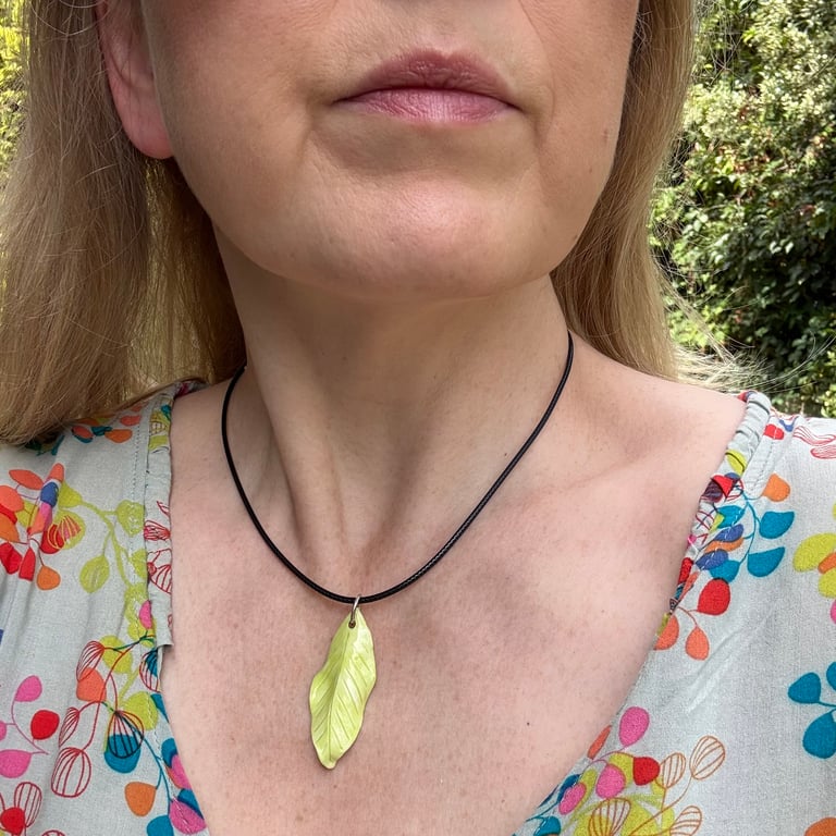 Glazed porcelain leaf pendant