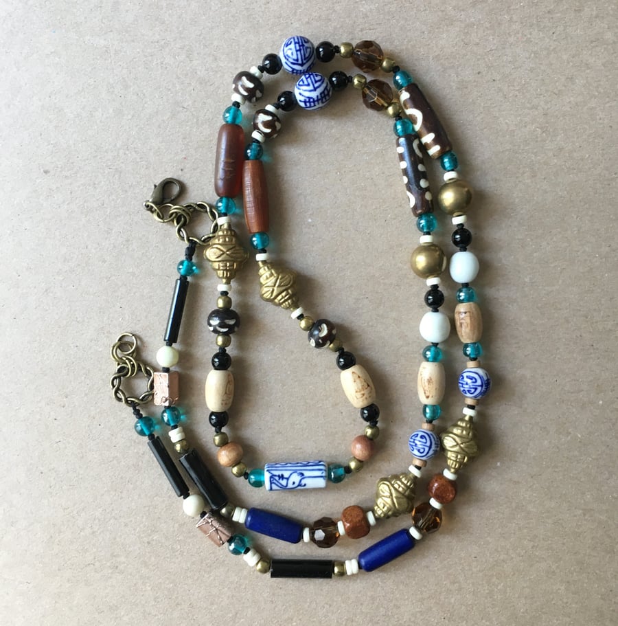 Gorgeous hand knotted 100 cm long statement necklace with various glass beads