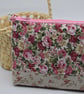 Feminine chintz storage pouch or bag, carefully crafted from quality fabrics.