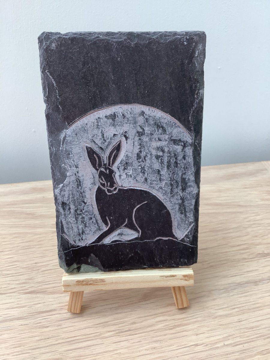 Hare sitting in front of the moon - original art hand carved on slate