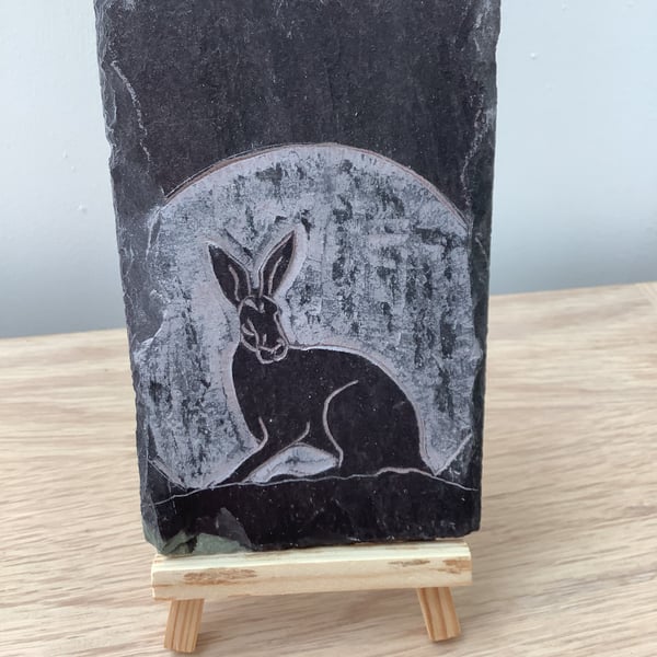 Hare sitting in front of the moon - original art hand carved on slate