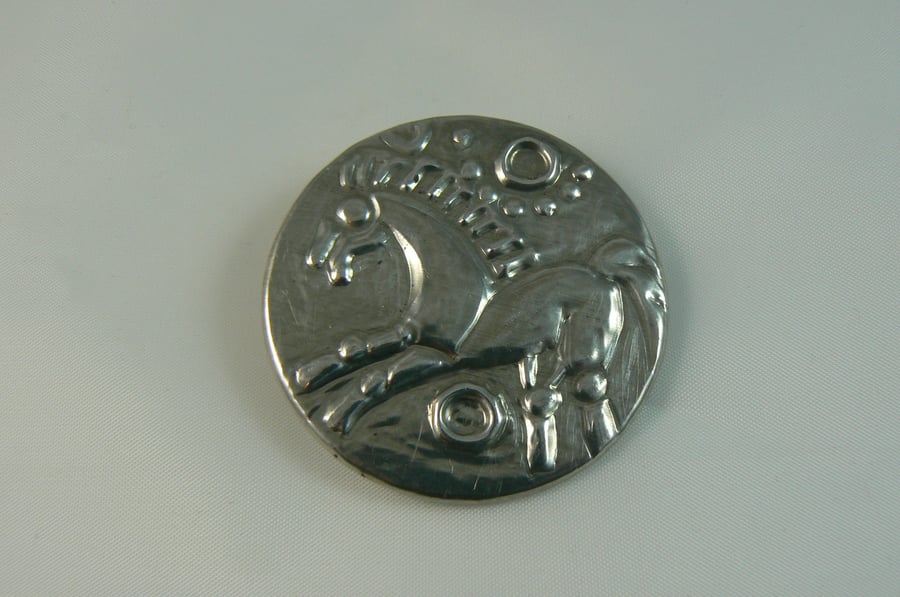 Pewter brooch (celtic coin)