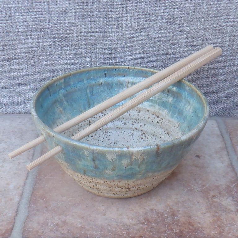Hand thrown stoneware ceramic ramen noodle bowl in raspberry pink glaze 