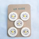 Pretty daisy ceramic buttons handmade and hand painted. 