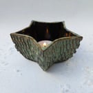 Candle Holder in black porcelain, with carved texture - toasted green star