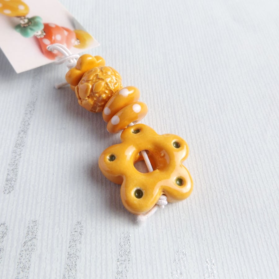 Handmade Pumpkin Orange Ceramic Bead Set with Flower Pendant