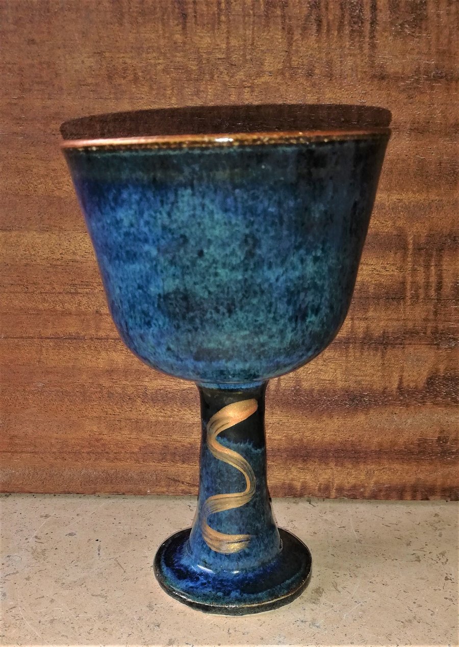 Wine delightful, tactile, blue, gold rimmed, ceramic goblets