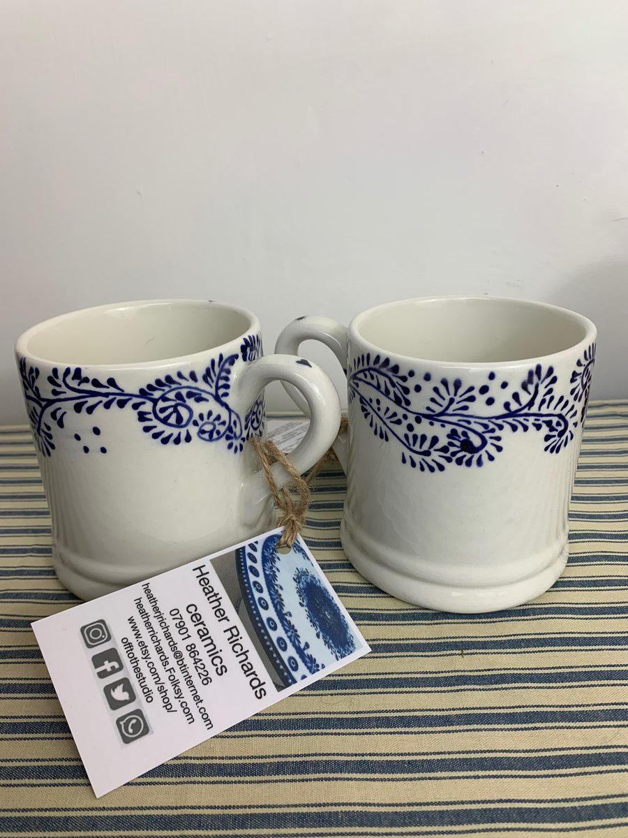 blue and white foliage mugs