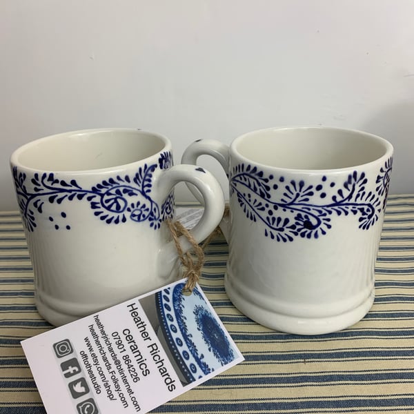 blue and white foliage mugs