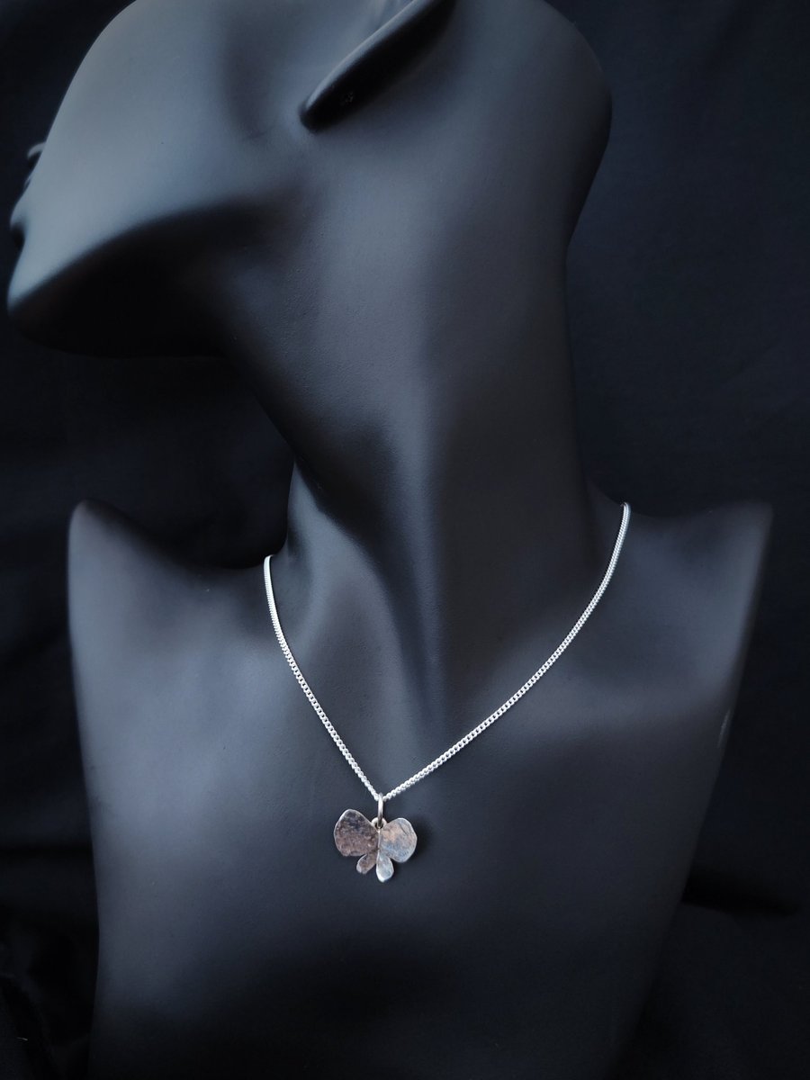 Delicate silver butterfly pendant