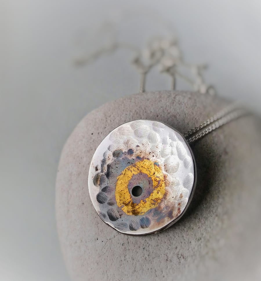 Unusual silver nature inspired necklace with gold