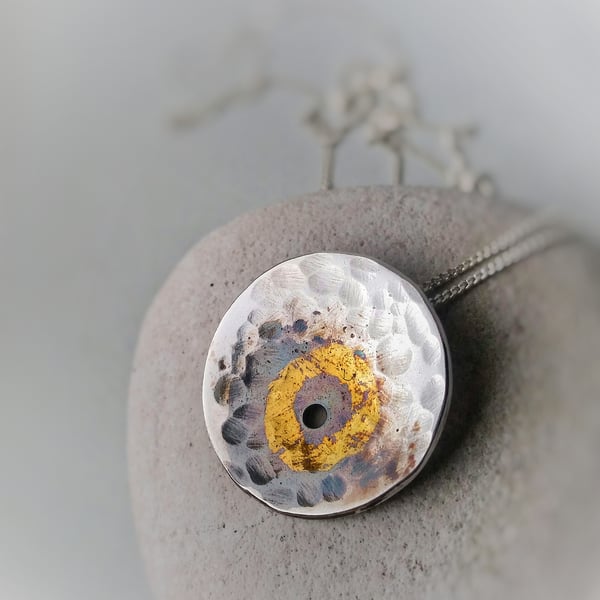 Unusual silver nature inspired necklace with gold