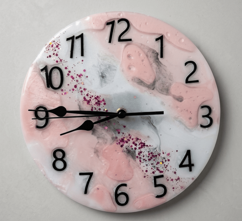 Handmade pink and white epoxy resin clock with hanger. Battery operated.