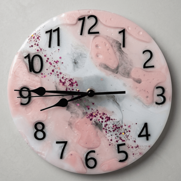Handmade pink and white epoxy resin clock with hanger. Battery operated.