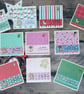 Set of ten assorted Christmas cards with wooden charms.